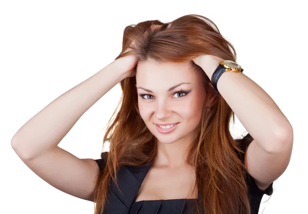 Beautiful girl straightens her hair — Stock Photo, Image