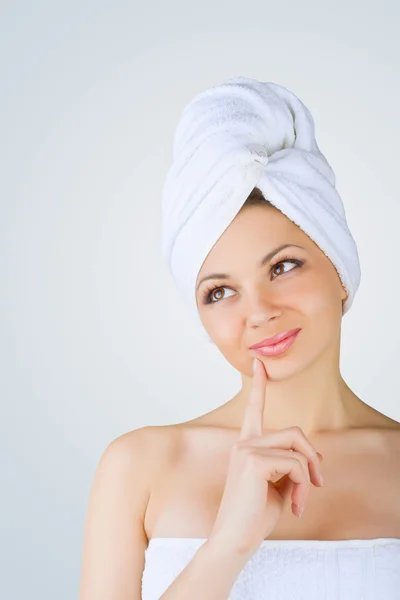 A beautiful girl wrapped in the bathtowel — Stock Photo, Image