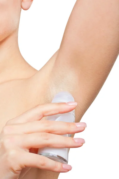 Woman uses deodorant — Stock Photo, Image