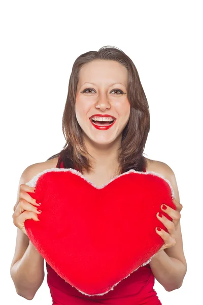 Beautiful smiling woman with a gift of the heart — Stock Photo, Image