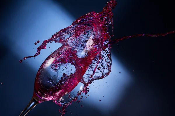 Wine splashing Stock Photo