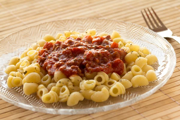 stock image Lumache pasta with bolognese sauce