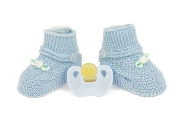 Sapatos de bebê azul e manequim — Fotografia de Stock