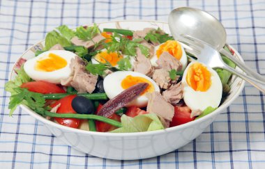 Nicoise salad and serving tools clipart