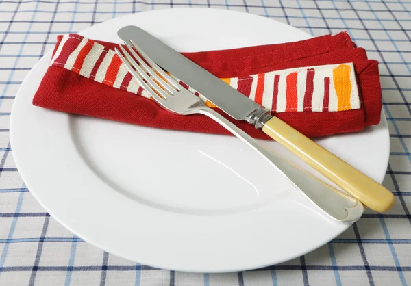 Knife, fork, table and napkin — Stock Photo, Image
