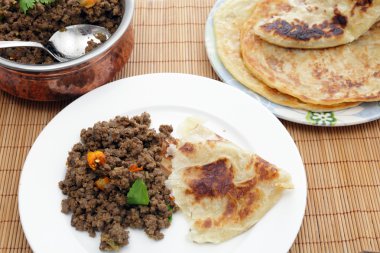 Keema curry with paratha clipart