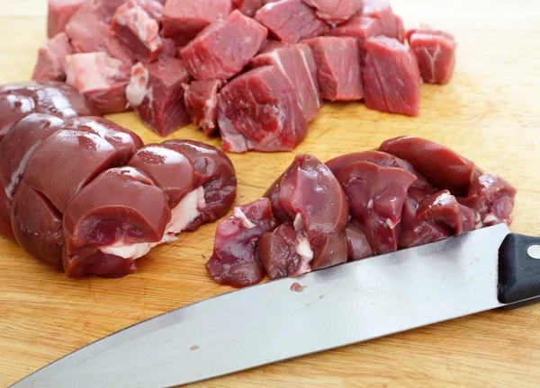 Chopping steak and kidney — Stock Photo, Image