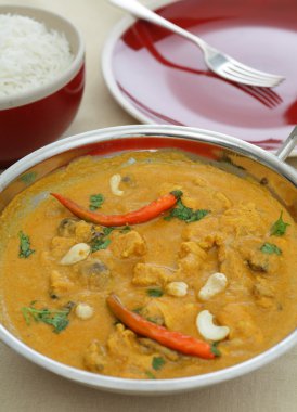 Chicken cashew curry vertical clipart