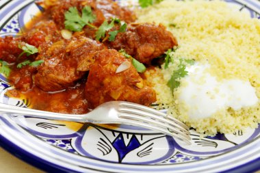 Chicken tagine meal closeup clipart