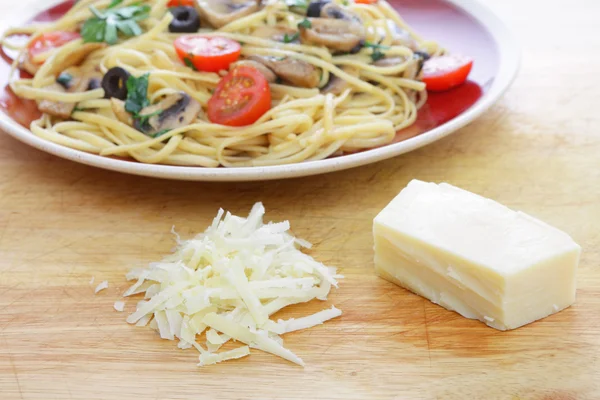 Parmesan cheese and pasta — Stock Photo, Image