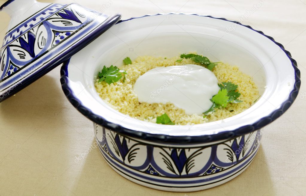 Couscous topped with yoghurt