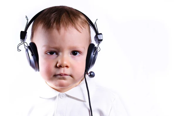 Jonge jongen dragen telefoon headset — Stockfoto