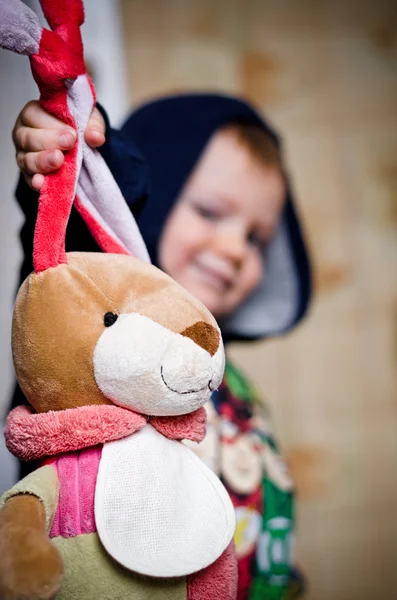 Hunter on toy hares — Stock Photo, Image