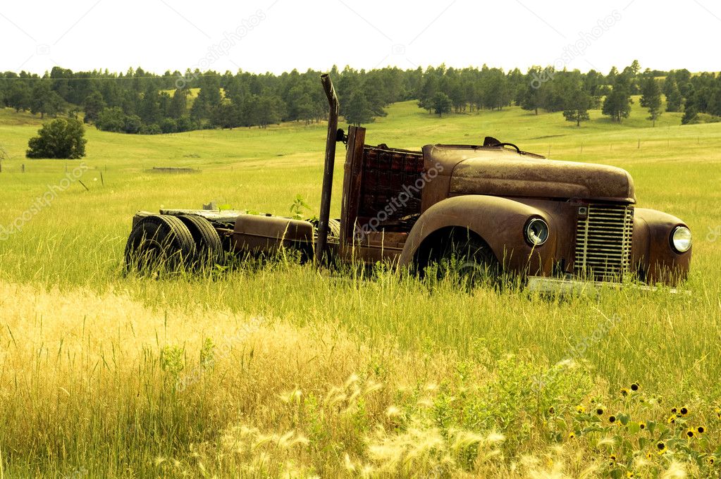 Vintage Junk Cars on Landscape