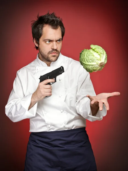 Chef with gun — Stock Photo, Image