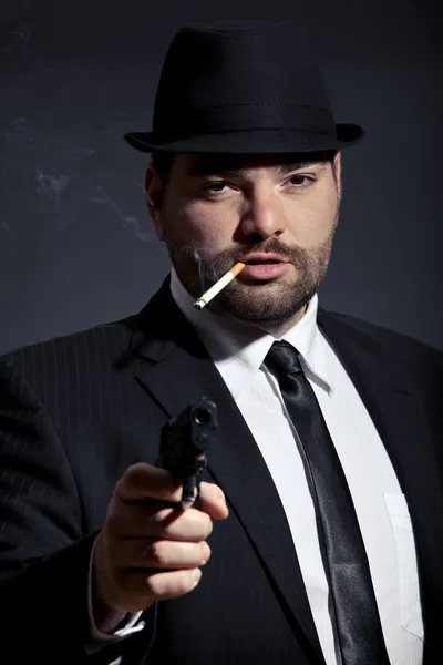 Dangerous man with a gun — Stock Photo, Image