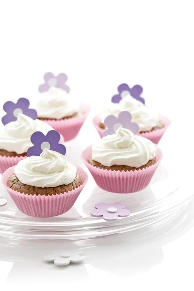 Delicious cupcakes with sweet cream — Stock Photo, Image