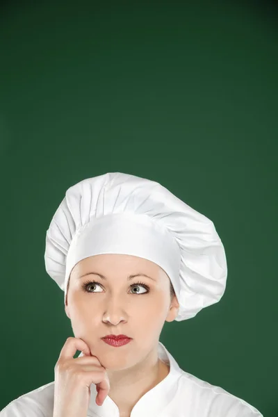 Młody kucharz kobiece myślenia — Zdjęcie stockowe