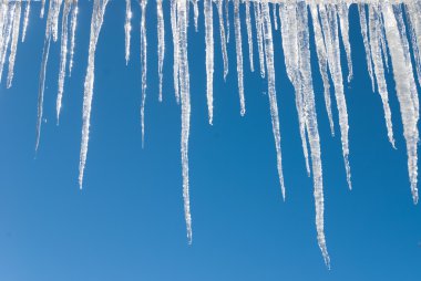 Icicles and Blue Sky clipart