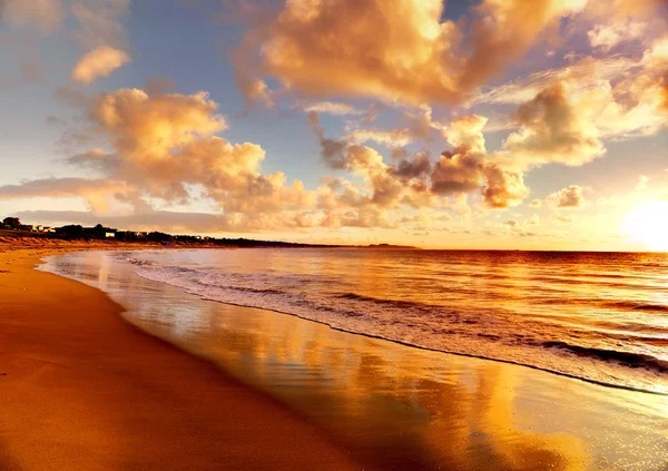 Sunset on the beach — Stock Photo, Image