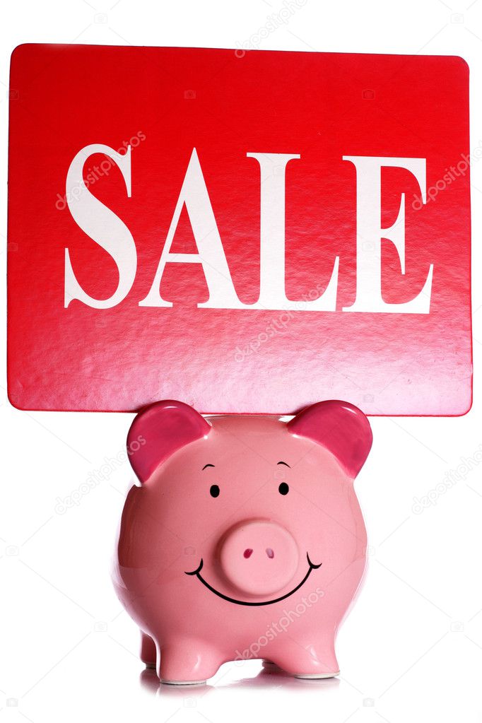 Sale sign and piggybank
