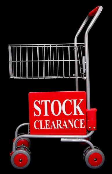 Carrello shopping con cartello di sdoganamento — Foto Stock