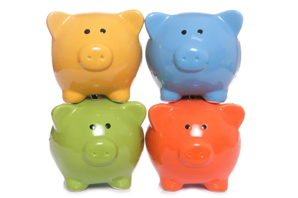 Quatro bancos Piggy empilhados — Fotografia de Stock