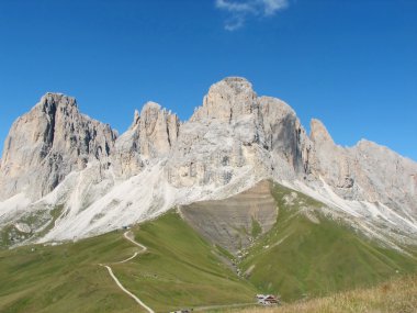 Italian Alps and the mountain of the five fingers in the middle clipart