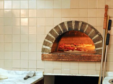 Oven for baking artisan of a true Neapolitan pizza clipart