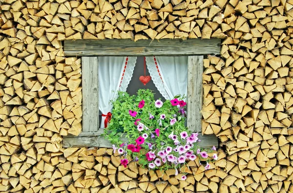 Ledge of a window surrounded by flowers freshly cut wood — Stock Photo, Image
