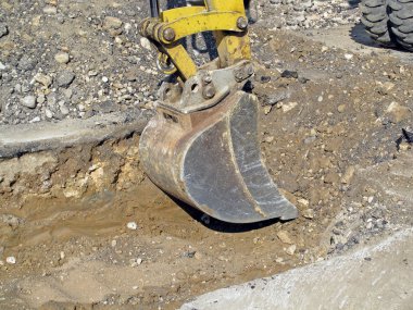 kazı sırasında bir roadworks tüm çalışmaya sıyırıcı