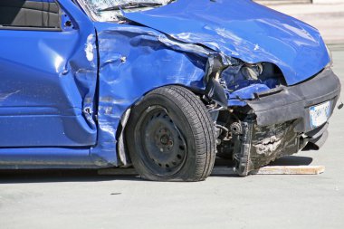 Wheel of a car destroyed in a traffic accident clipart