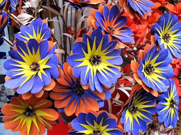 Blue wooden flowers handmade in italian retail market — Stock Photo, Image