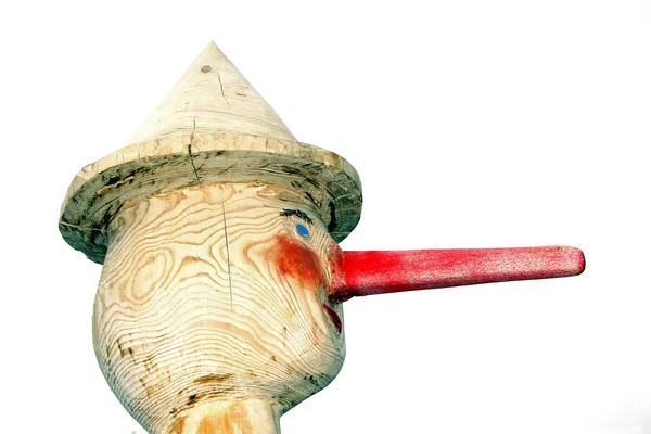 Pinocchio Puppengesicht mit seinen langen roten Nasen — Stockfoto