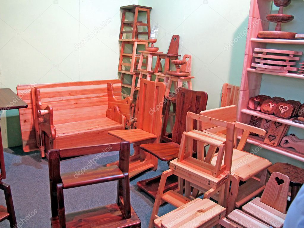 Furniture with tables and chairs stacked
