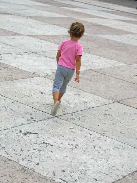 stock image Young girl run in Marostica walls and castle near Vicenza
