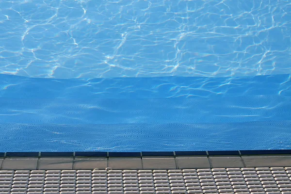 Blue water of the swimming pool for swimming — Stock Photo, Image