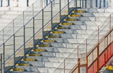 Bleachers on the sidelines of the first stages of a game clipart