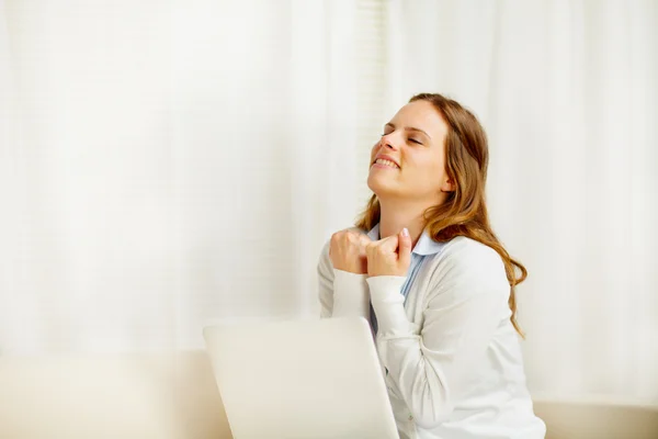 Young excited woman celebrating a victory — Stock Photo, Image