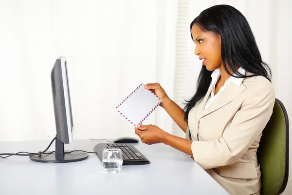 Pretty businesswoman checking the mail — Stock Photo, Image