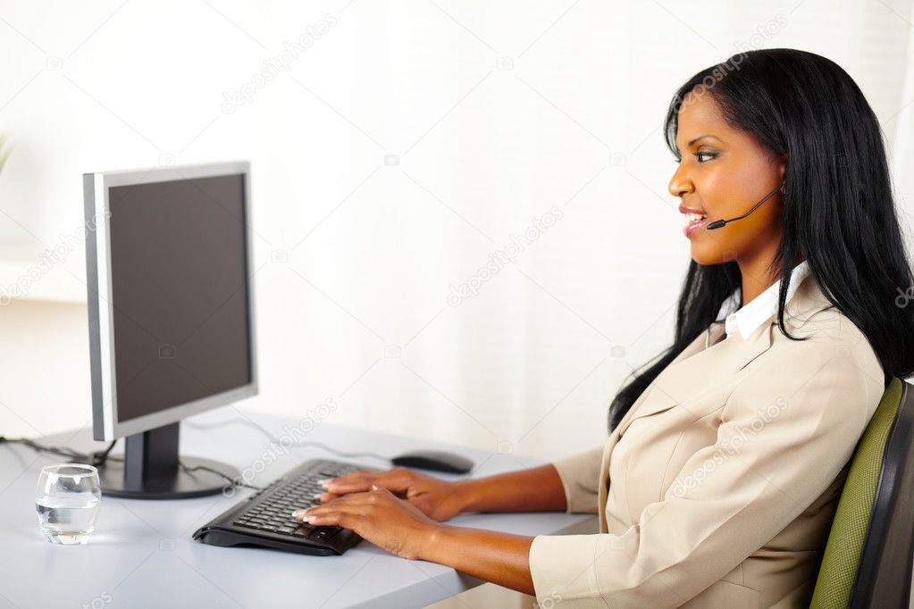 Callcenter operator working on computer