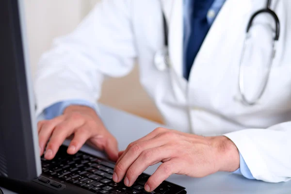 stock image Professionals doctor hands working on computer