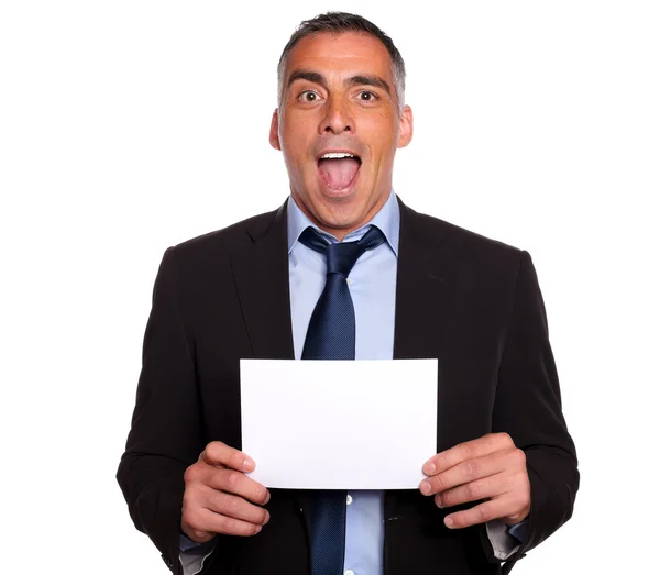 Hispanic friendly man showing a while card — Stock Photo, Image