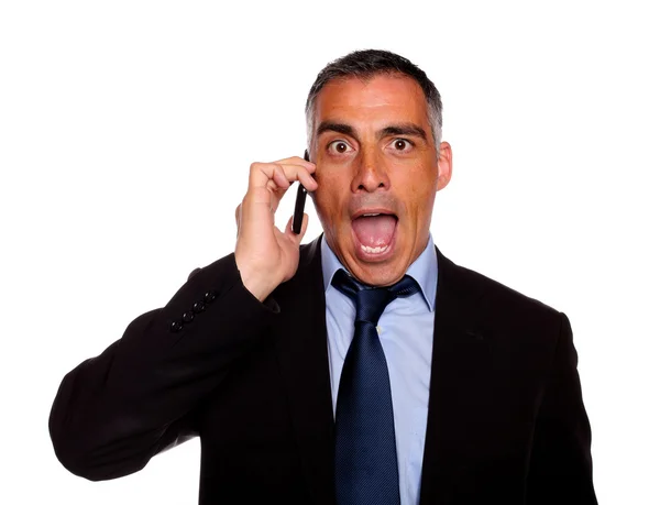 Surprised business man on cellphone — Stock Photo, Image