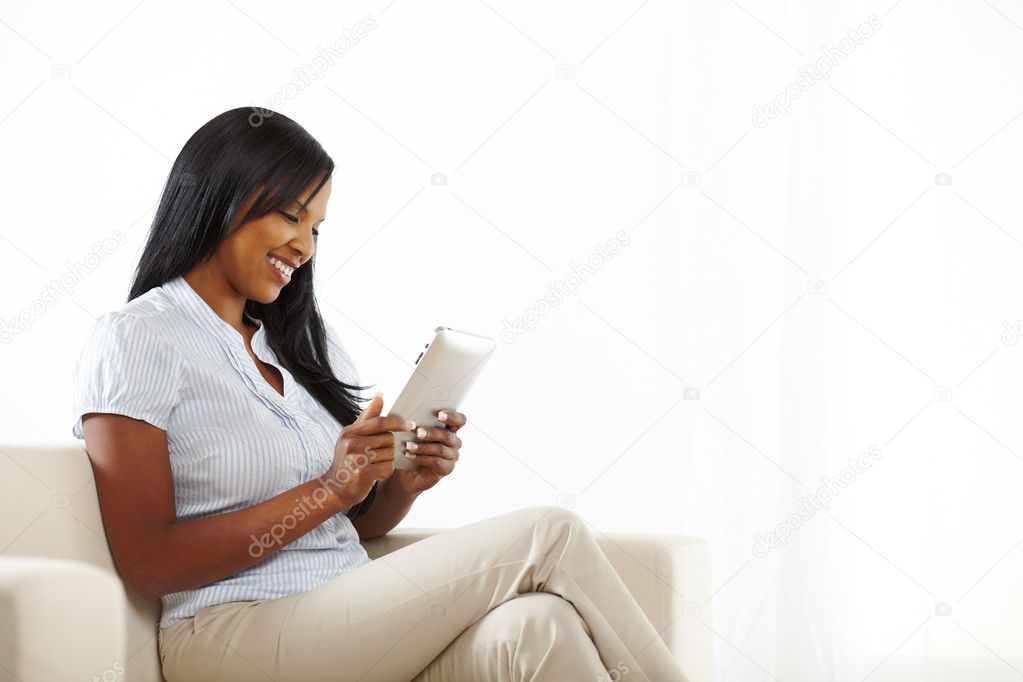 Young woman having fun with a tablet PC