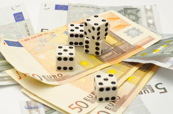 Five dices on money — Stock Photo, Image