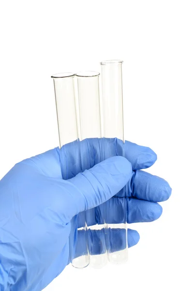 Hand in glove with test-tube — Stock Photo, Image