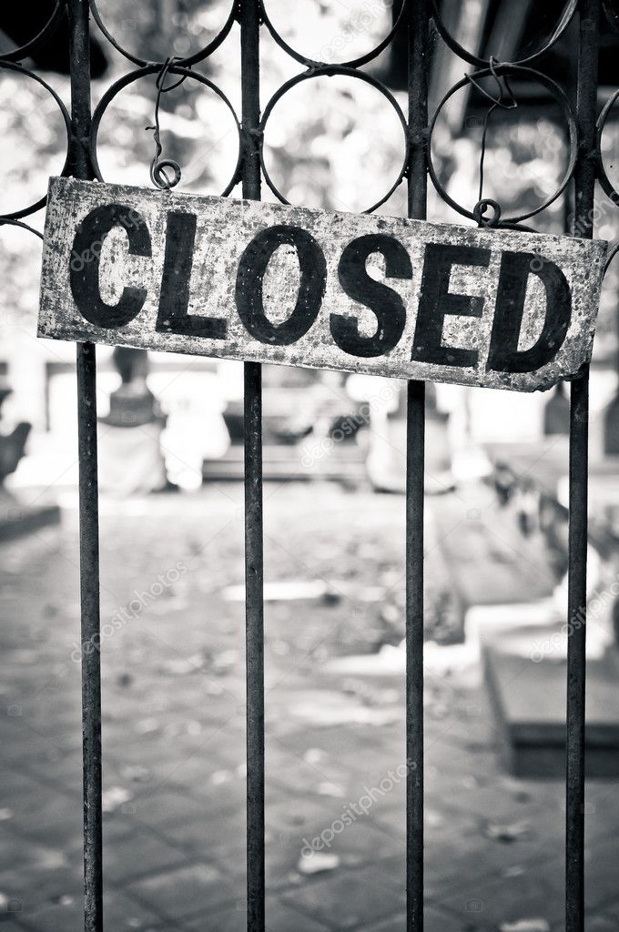 Closed sign on metal doors