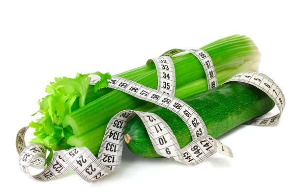 Celery zucchini squash and measure tape — Stock Photo, Image
