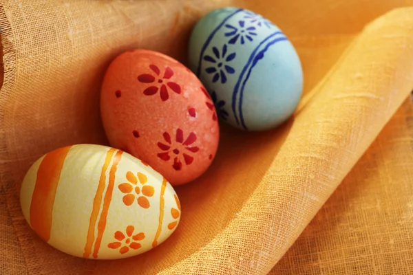 Easter eggs on textile — Stock Photo, Image